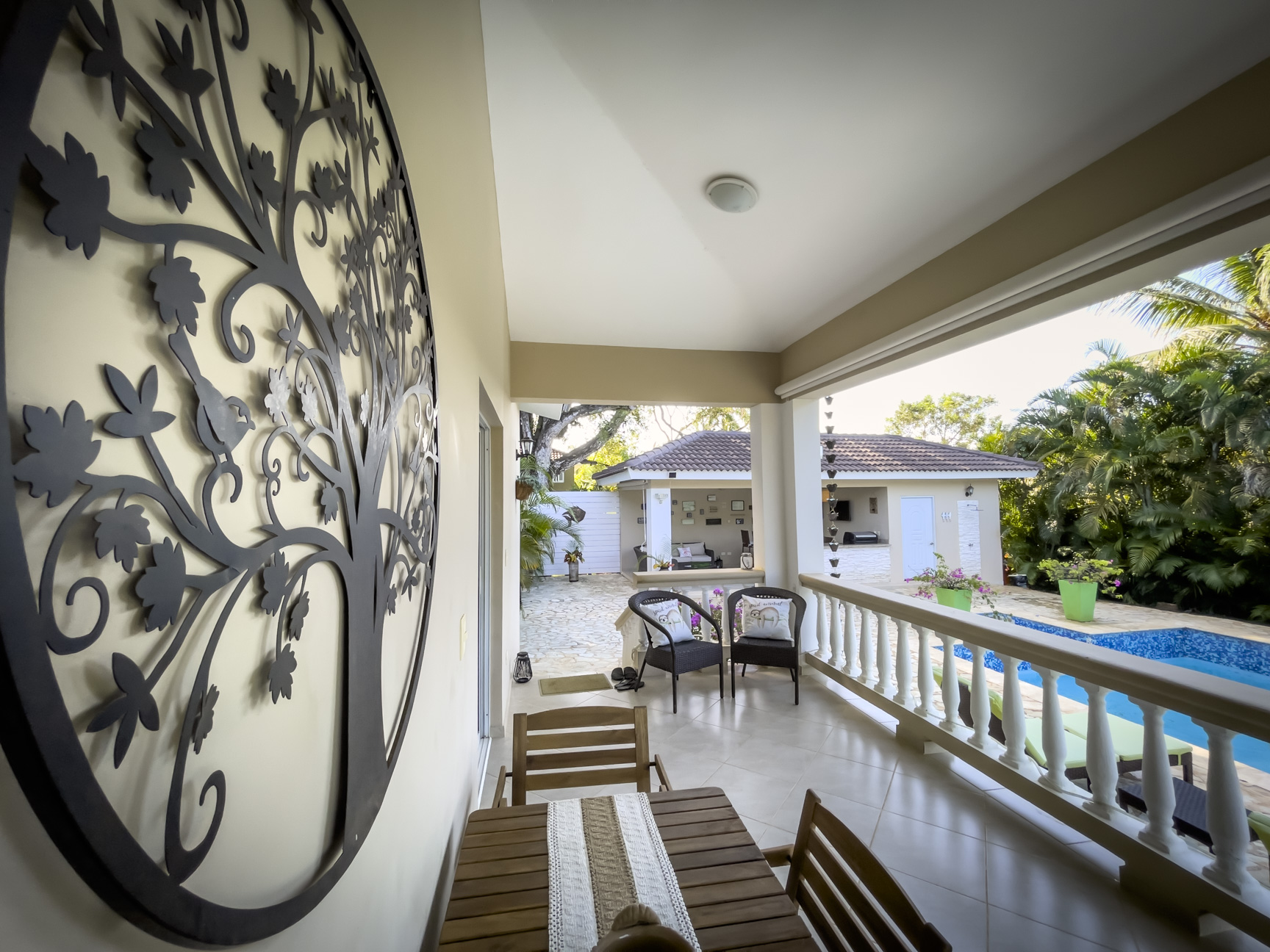 buyDRproperty Outdoor patio of a stunning 2 bedroom villa with pool view Sosua Real Estate