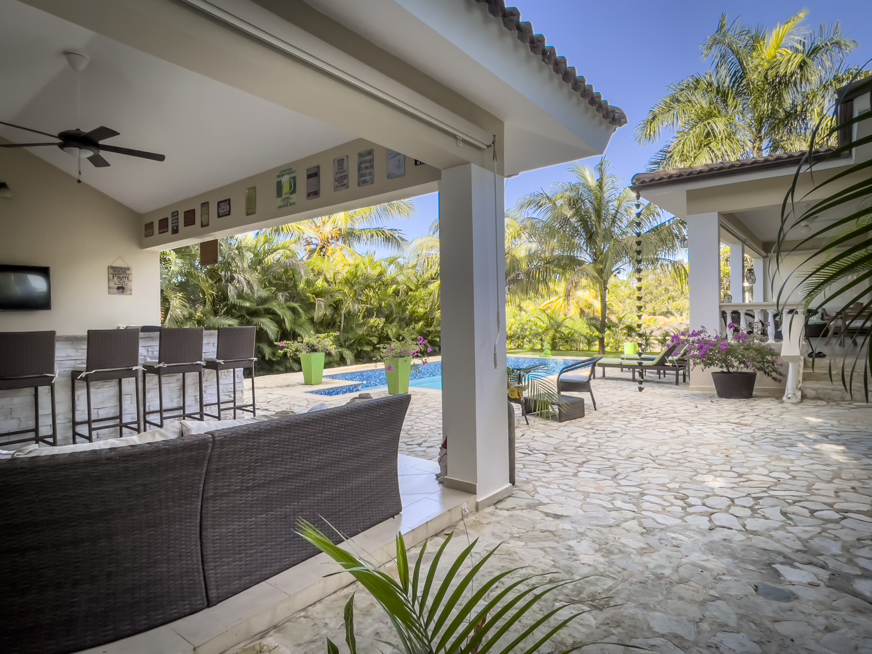 buyDRproperty Outdoor patio of a stunning 2 bedroom villa with pool access. Sosua Real Estate