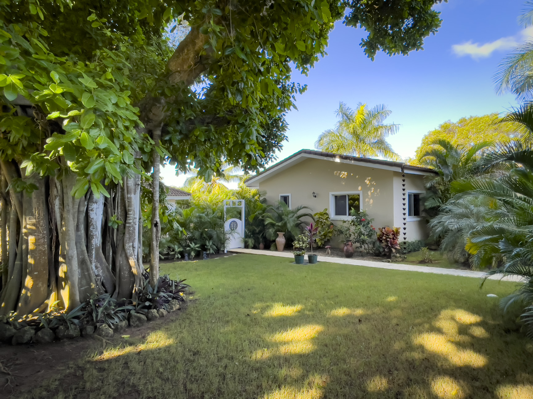 buyDRproperty Stunning 2 bedroom villa with lush landscaping and a beautiful lawn. Sosua Real Estate