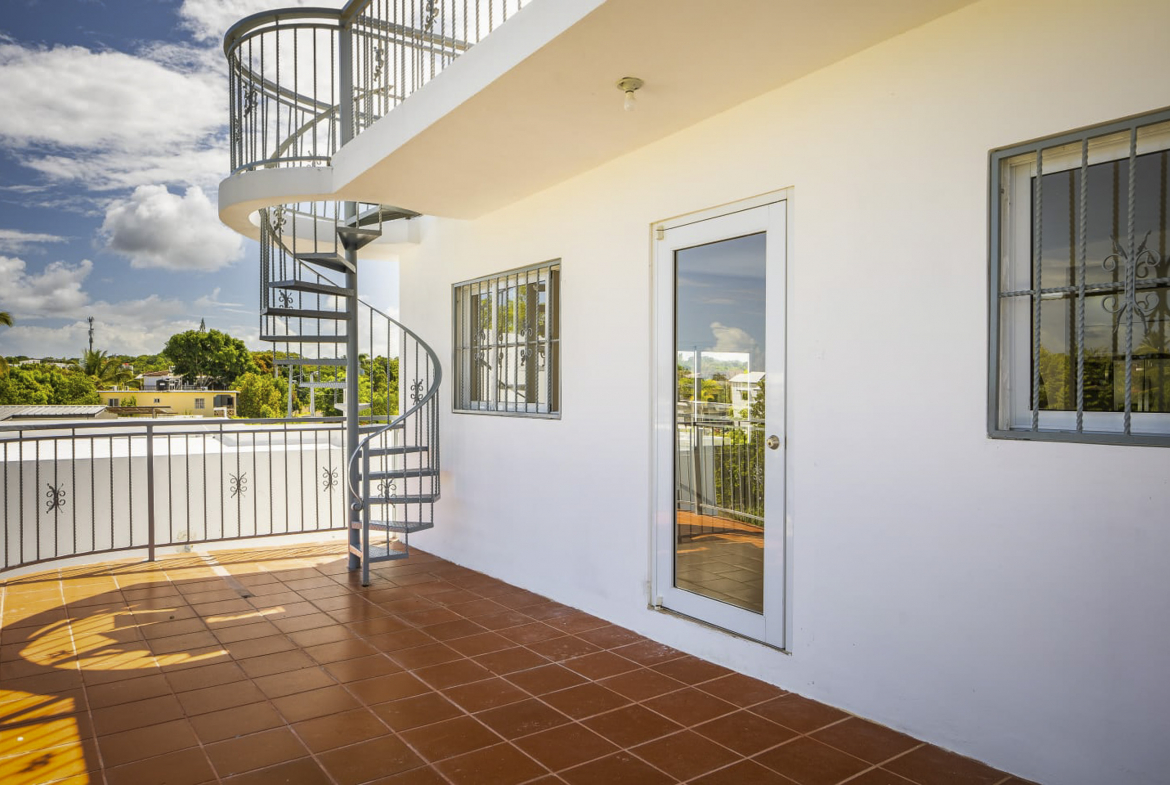 3 Bedroom Penthouse Spiral staircase to Patio