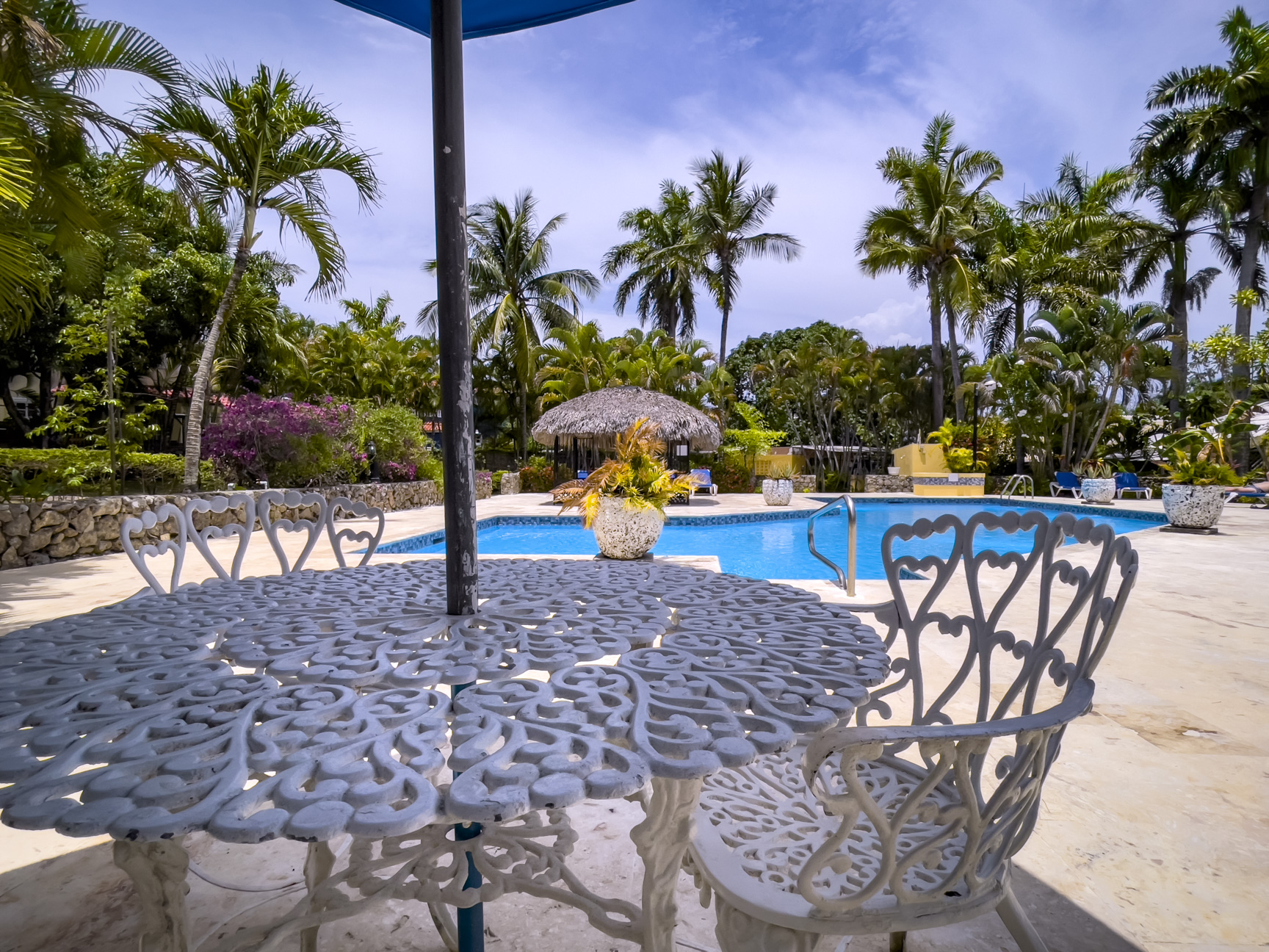 Condo For Sale In Trade Winds Patio and Pool Area
