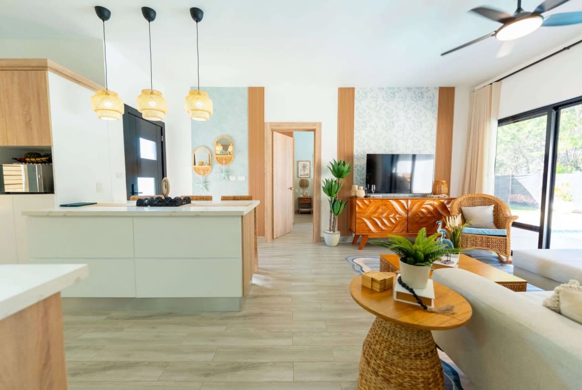 Villa Capri Casa Linda: Open-plan living, dining, and kitchen area in a 2BR new construction villa