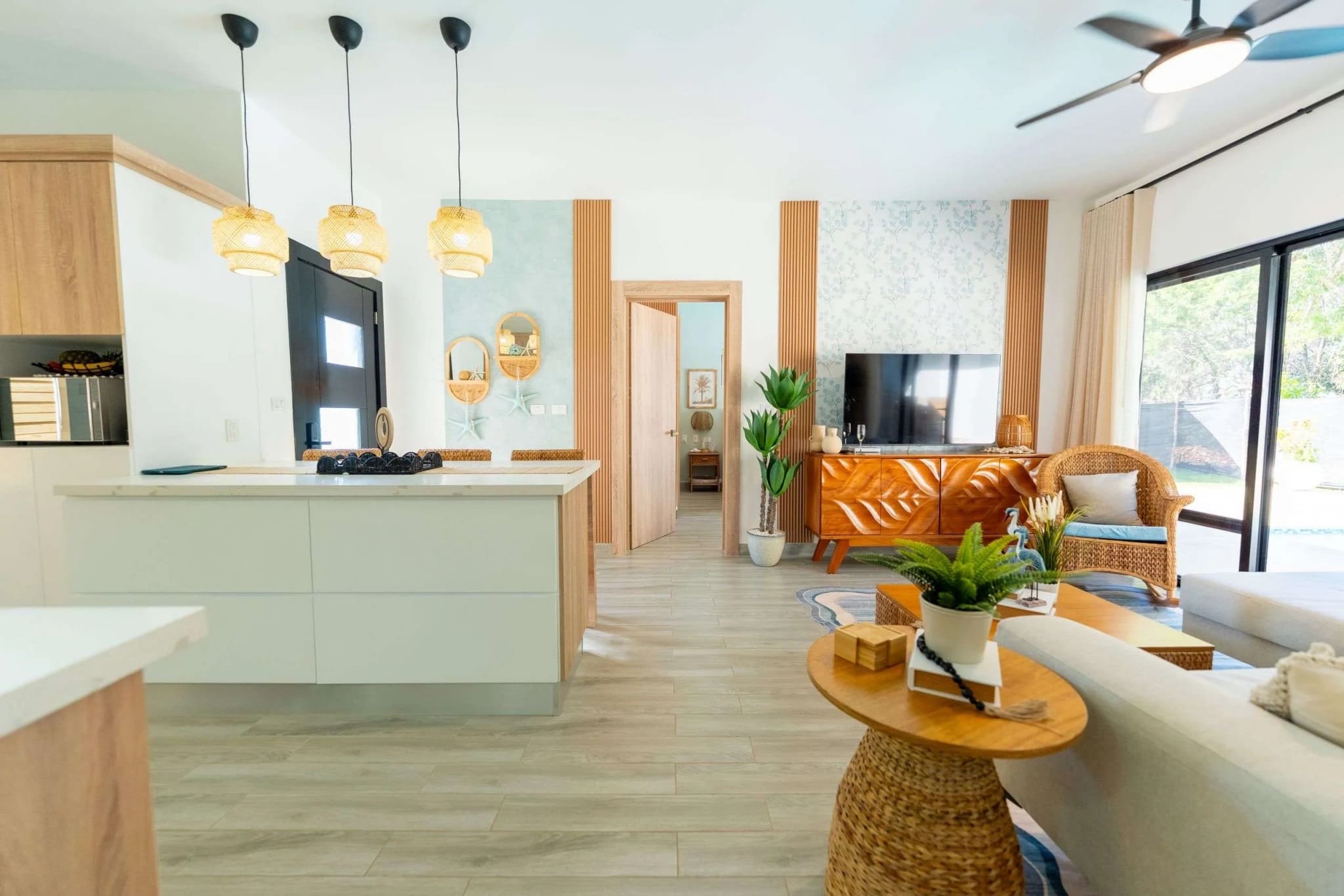 Villa Capri Casa Linda: Open-plan living, dining, and kitchen area in a 2BR new construction villa