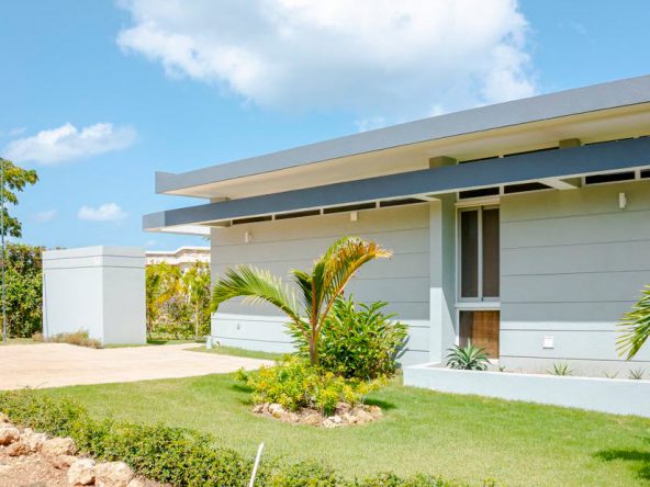 buyDRproperty Modern Beautiful Villa WHITESAND in Casa Linda with lush landscaping. Sosua Real Estate
