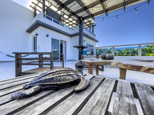 buyDRproperty Rooftop terrace of a modern 3-bedroom villa for sale in Sosúa Ocean Village with ocean views