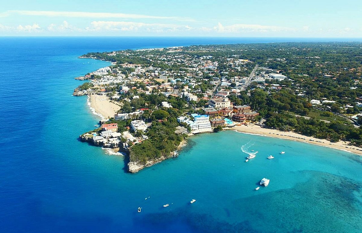 buyDRproperty Aerial view of the North Coast DR with turquoise water and a beach Sosua Real Estate