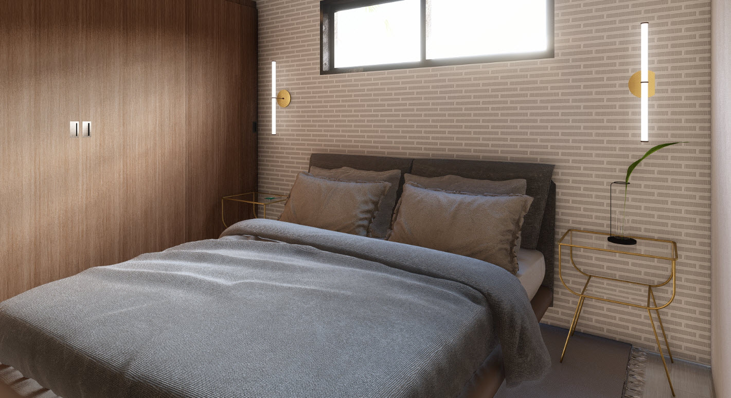 buyDRproperty Cozy bedroom with a gray bedspread and Bliss wall sconces. Sosua Real Estate