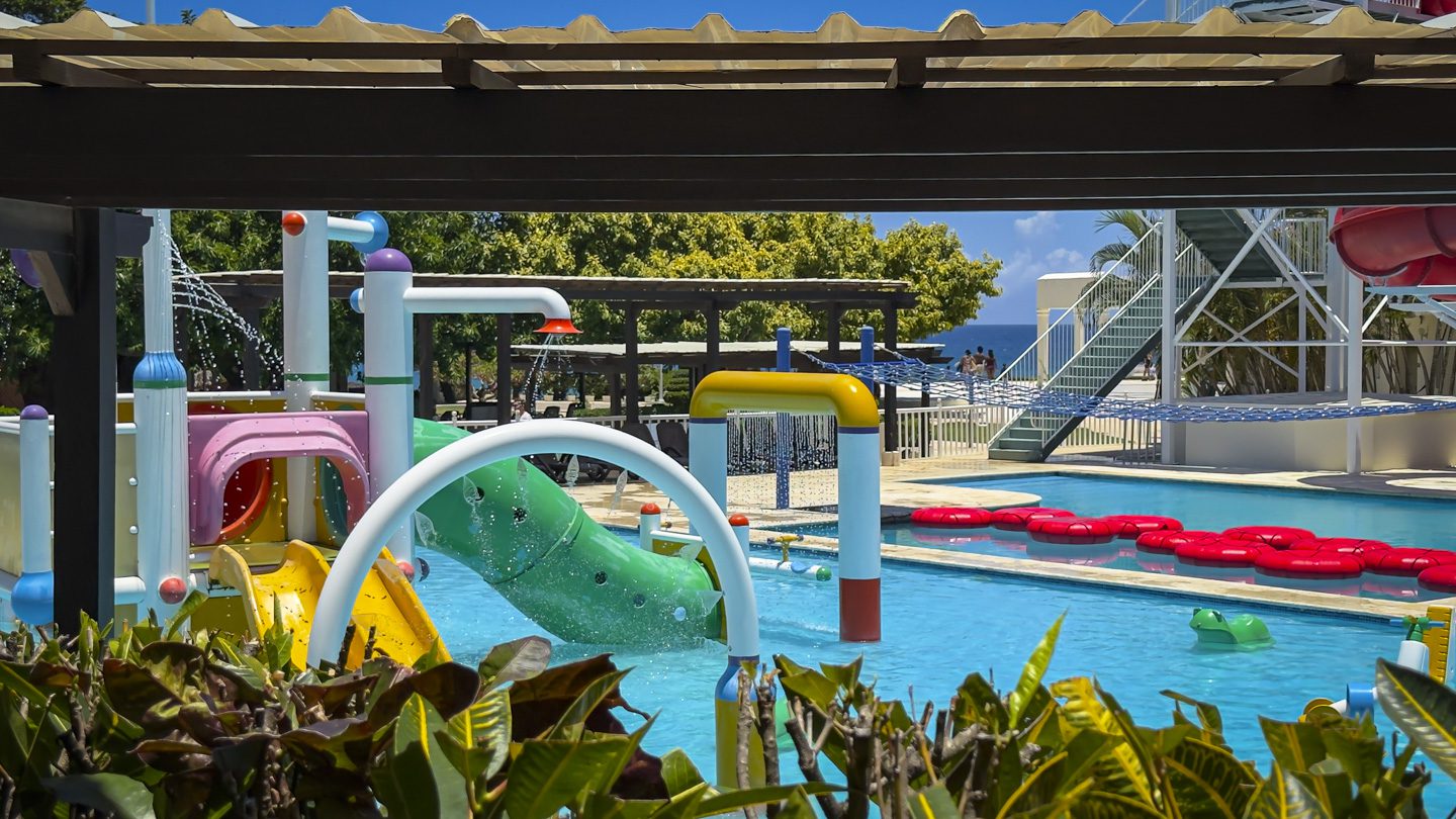 buyDRproperty Water park with slides and water features at a resort Sosua Real Estate