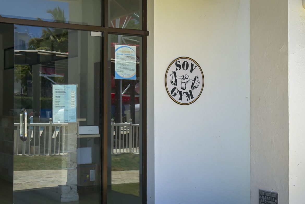 buyDRproperty SOV Gym entrance with logo Sosua Real Estate