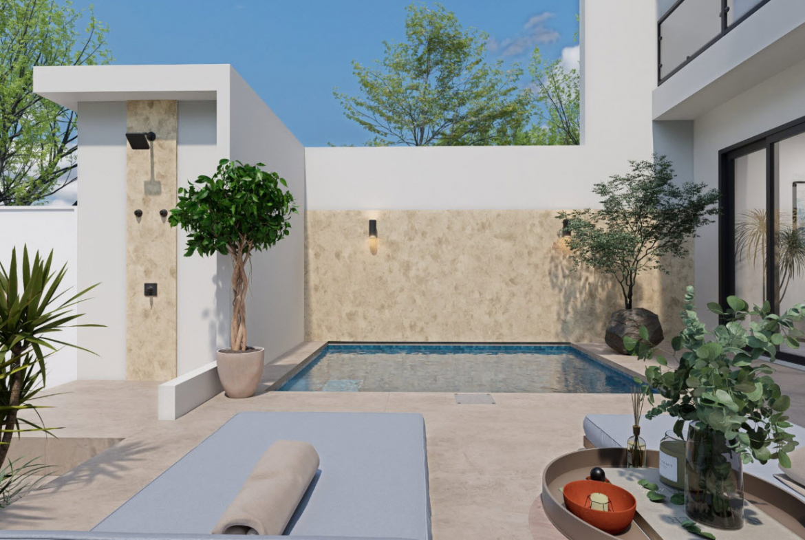 buyDRproperty Modern townhouse outdoor space with pool, lounge chairs, and greenery Sosua Real Estate