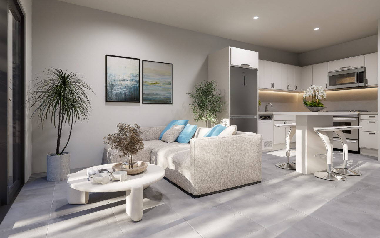 buyDRproperty Stylish townhouse living room with sectional sofa and modern kitchen Sosua Real Estate