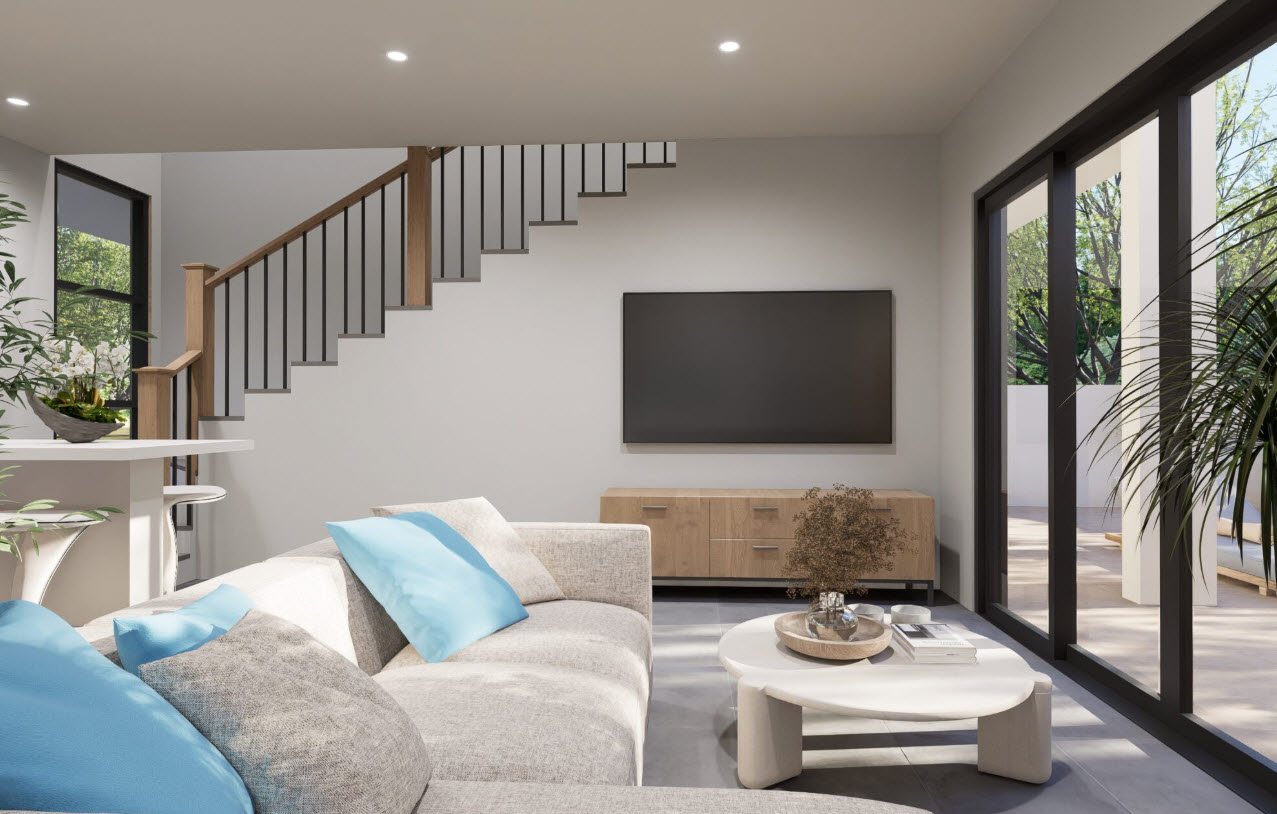 buyDRproperty Living room with a staircase, television, and a view of a patio in a Casa Linda townhouse. Sosua Real Estate