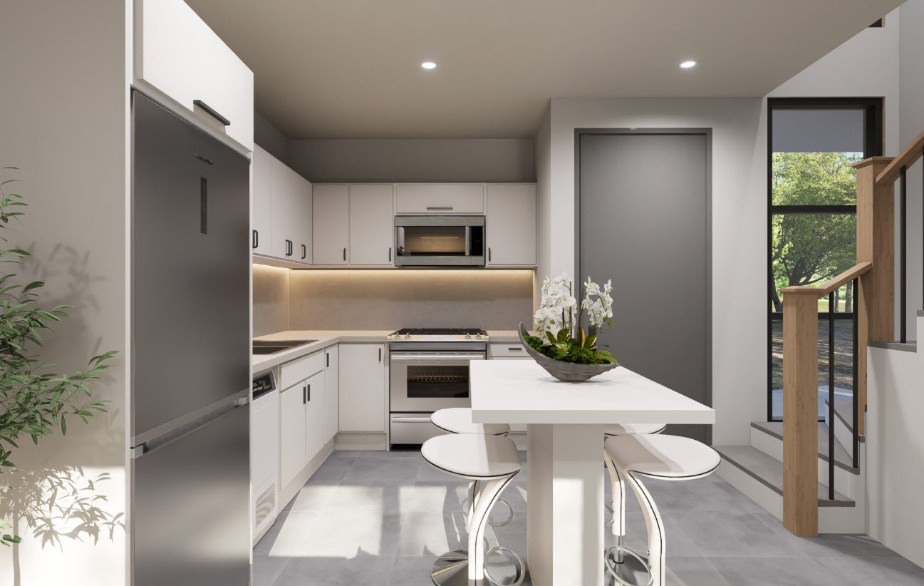 buyDRproperty Modern kitchen with white cabinets, stainless steel appliances, and a breakfast bar in a Casa Linda townhouse. Sosua Real Estate