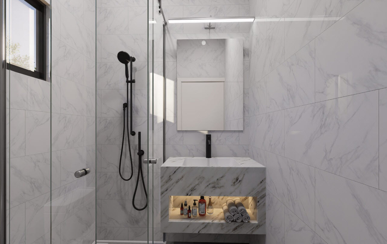 buyDRproperty Modern bathroom with marble tiles, black shower, and townhouse vanity with toiletries. Sosua Real Estate