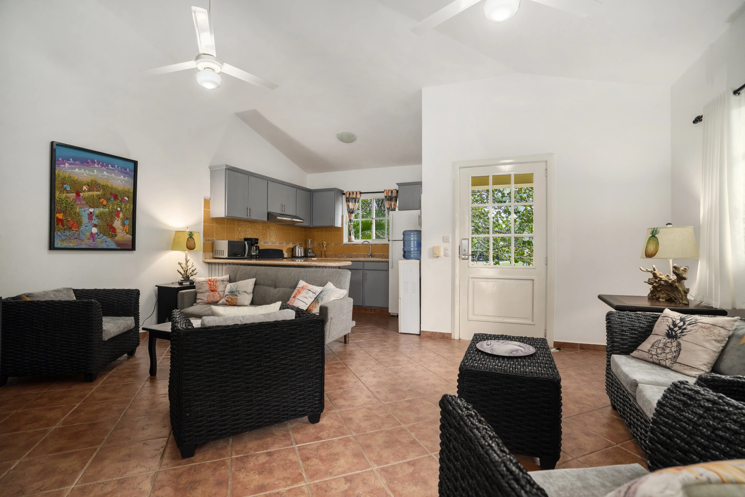 buyDRproperty Living room and kitchen interior of a villa for sale in Sosua. Sosua Real Estate