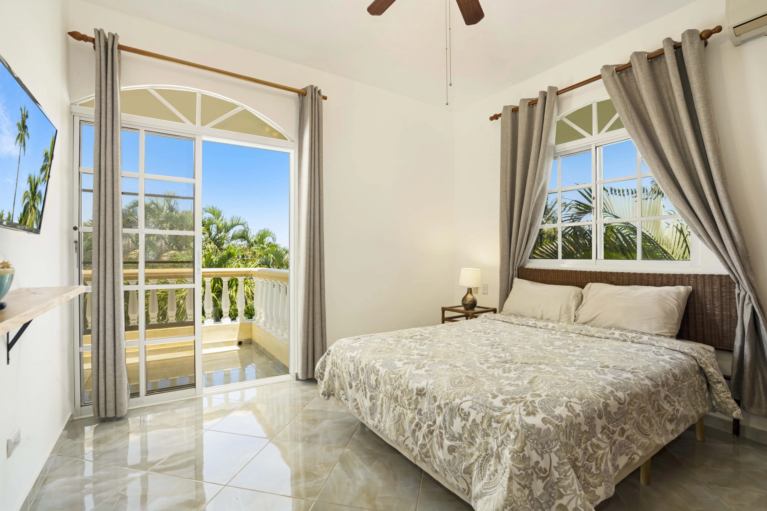 buyDRproperty Beautiful bedroom in a villa with a balcony view. Sosua Real Estate