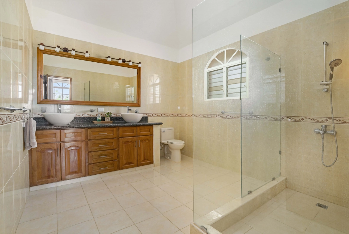buyDRproperty Beautiful bathroom with double vanity and walk-in shower. Sosua Real Estate