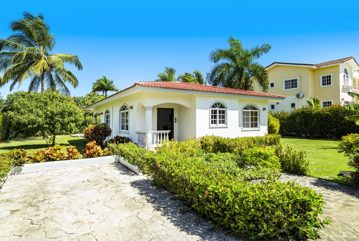 buyDRproperty Oversized Colibri model villa for sale in Sosua with lush landscaping. Sosua Real Estate