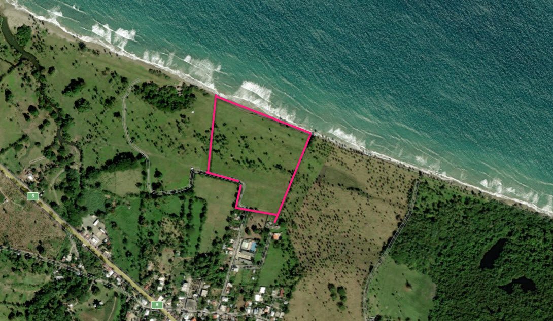 buyDRproperty Aerial view of beachfront land near Cabarete, Dominican Republic, with the ocean visible. Sosua Real Estate