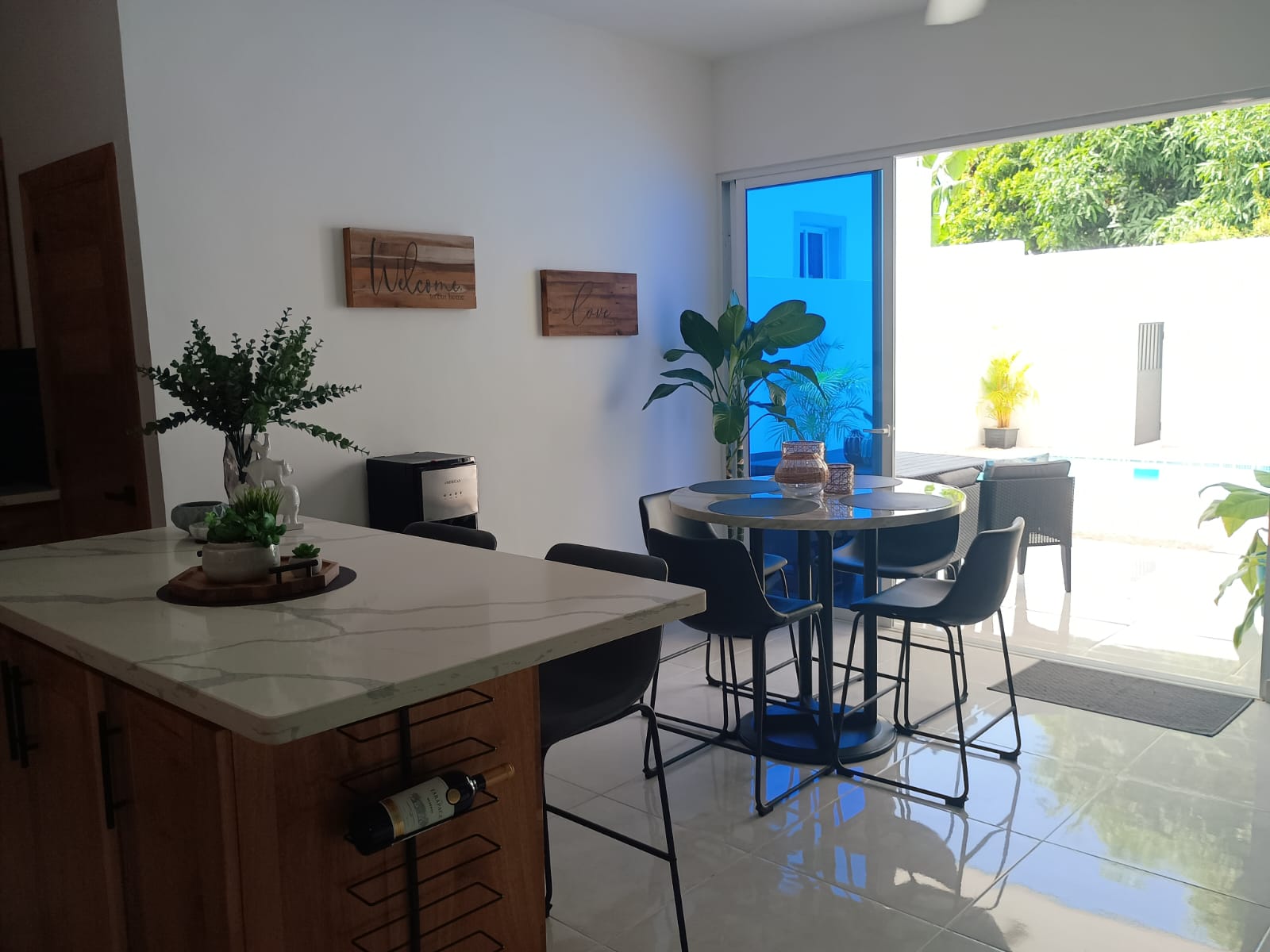 buyDRproperty Modern kitchen and dining area in a Puerto Plata villa with open plan design Sosua Real Estate