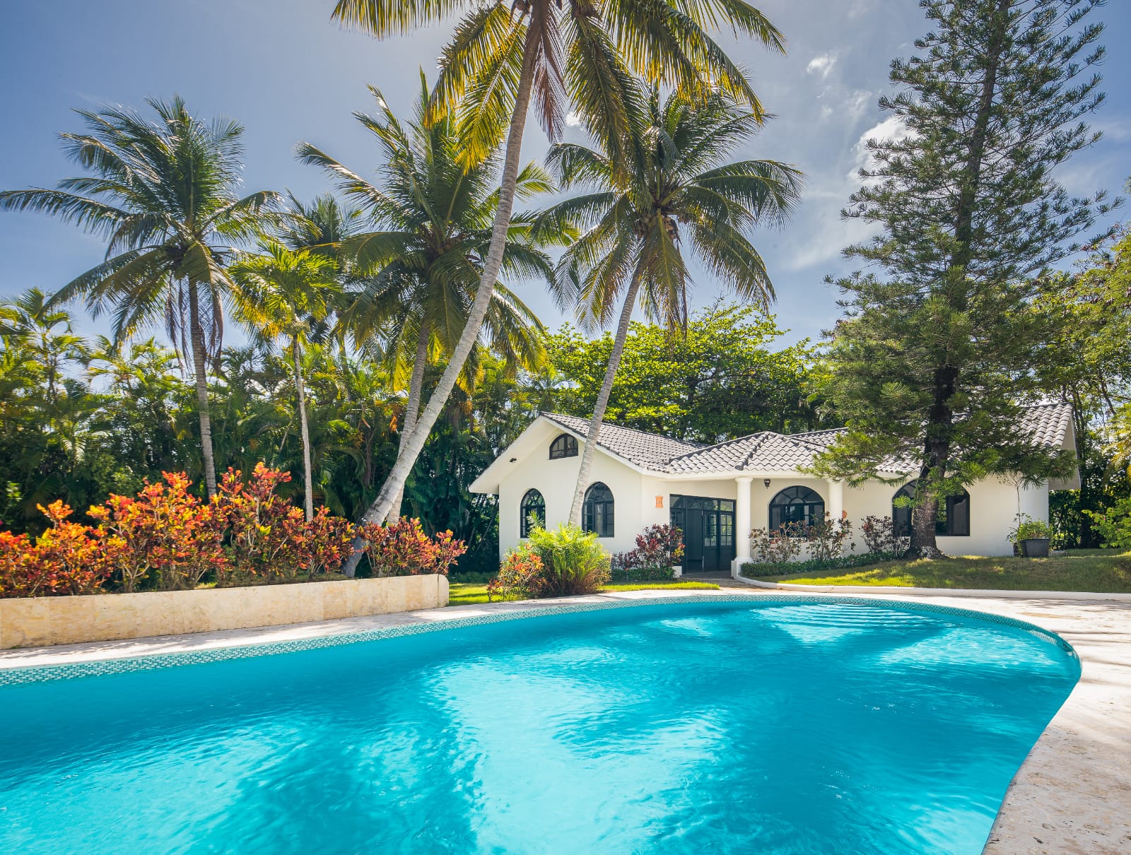buyDRproperty Luxury vacation rental villa with pool and palm trees Sosua Real Estate