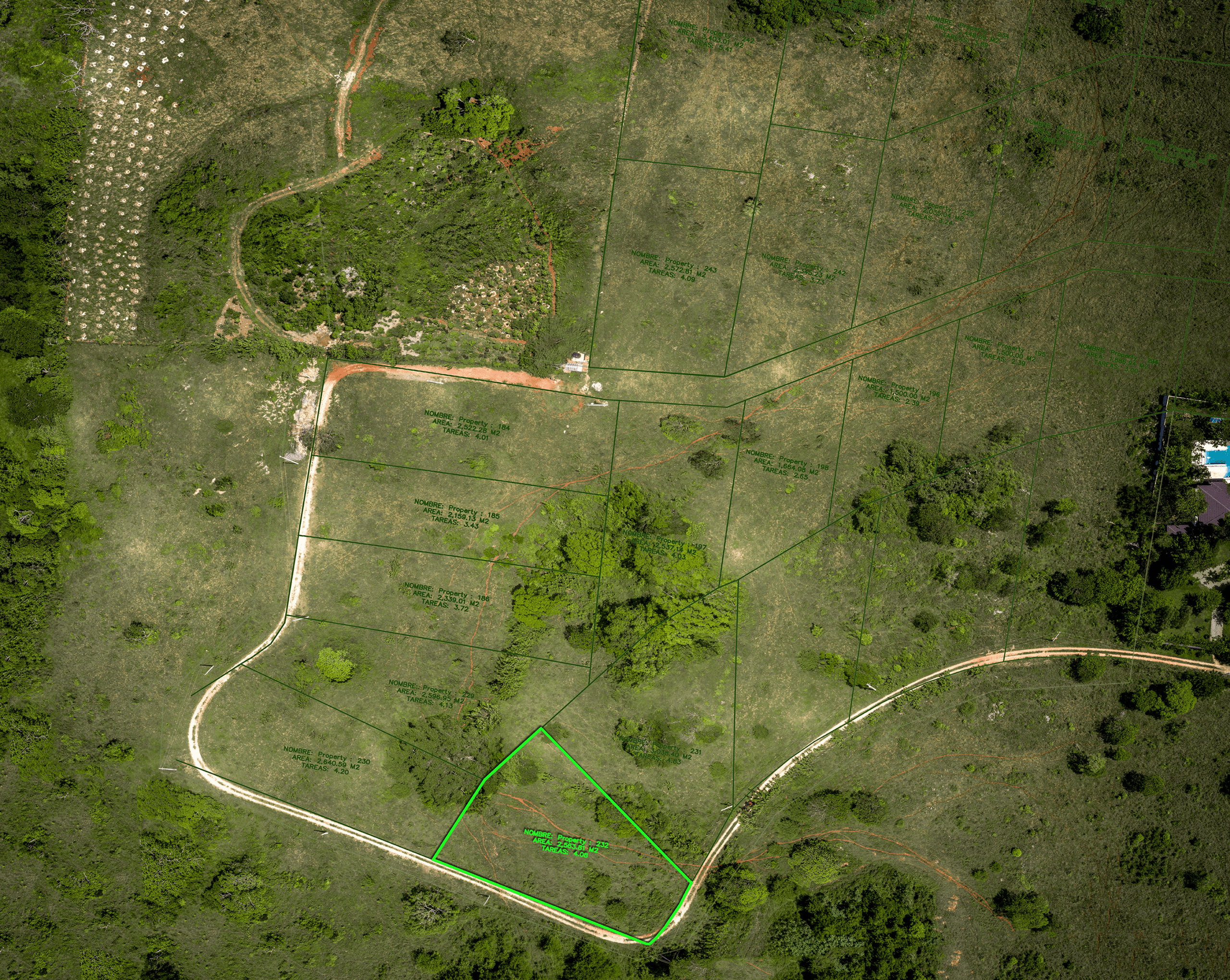 buyDRproperty Aerial view of marked plots in a lush green landscape Sosua Real Estate