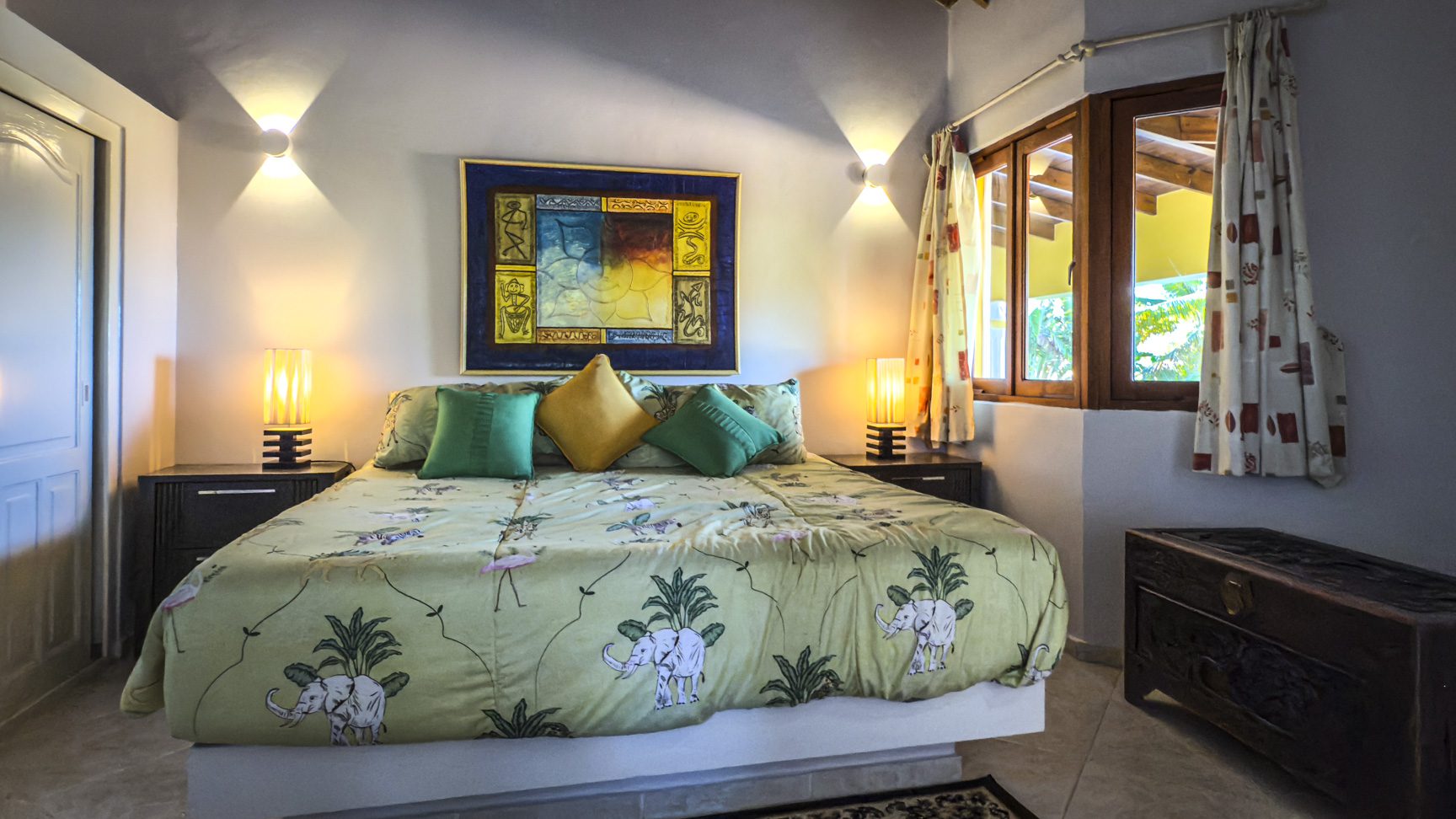 buyDRproperty Bedroom in an Ocean View Villa with elephant print bedding Sosua Real Estate