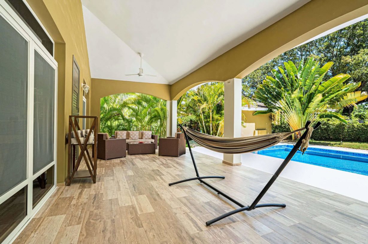 buyDRproperty Elegant patio with hammock and pool at Villa Lotus in Sosúa Sosua Real Estate