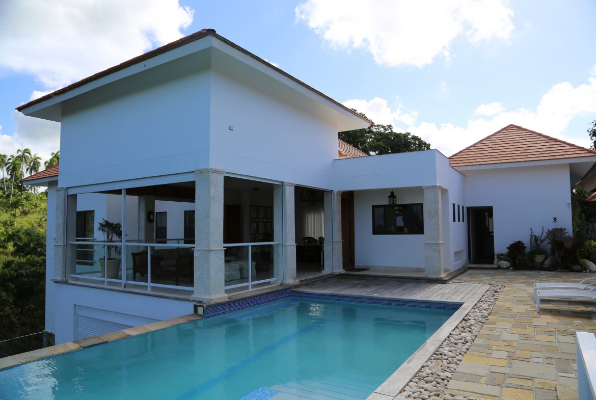 buyDRproperty Luxury Caribbean villa with a swimming pool and modern architecture. Sosua Real Estate