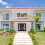 Buydrproperty Luxury Two story Villa with a Red Tile Roof and Manicured Lawn Sosua Real Estate Buydrpropertycom Buydrpropertycom