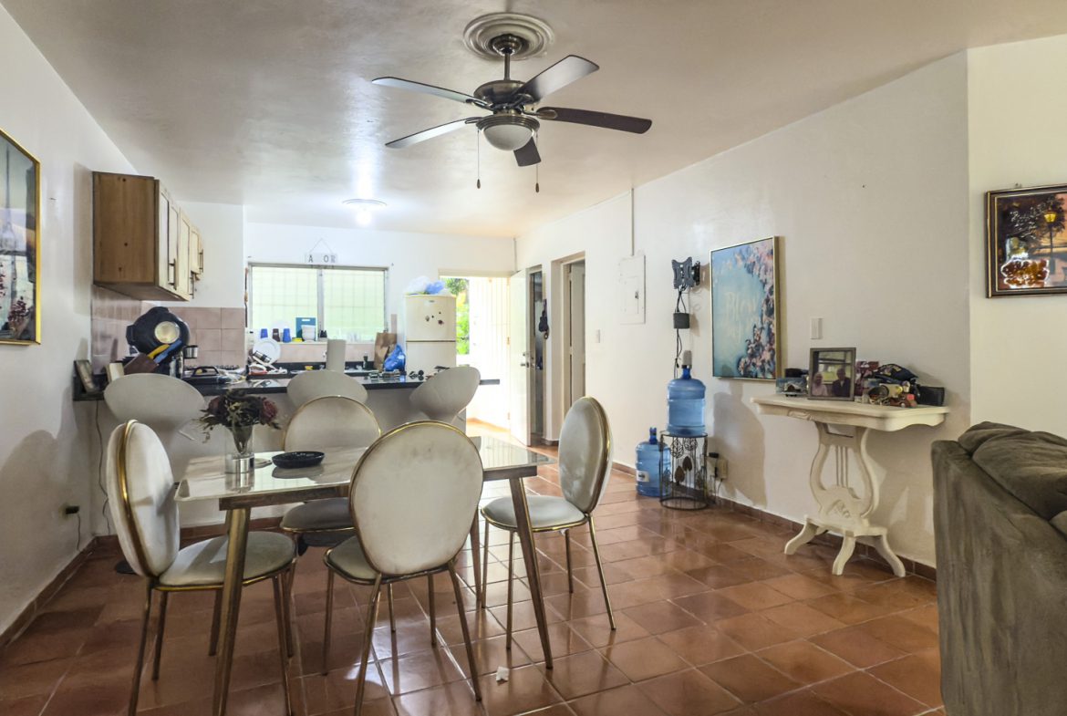 buyDRproperty Sosúa home interior: Dining area, kitchen, and living space with tile floors. Great value near playa! Sosua Real Estate