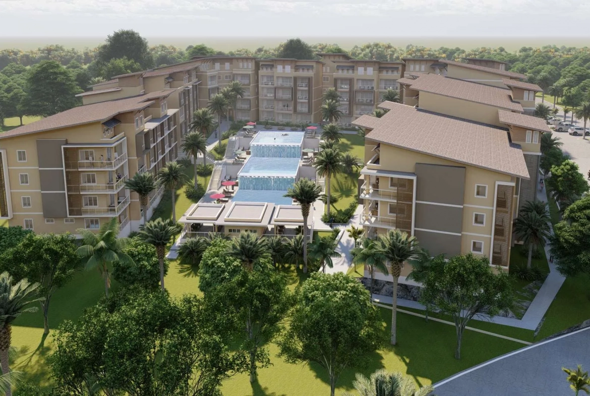 buyDRproperty Luxurious apartment complex with central pool surrounded by lush greenery Sosua Real Estate