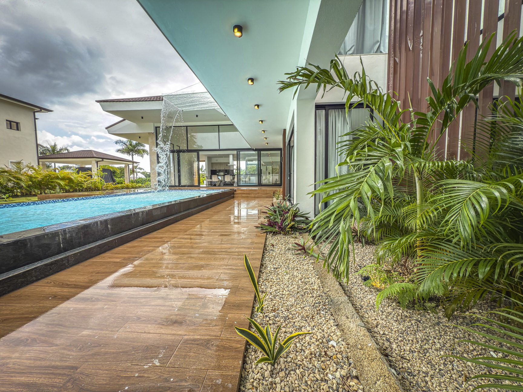 buyDRproperty Luxury villa with pool and waterfall feature at Sosua Ocean Village. Sosua Real Estate