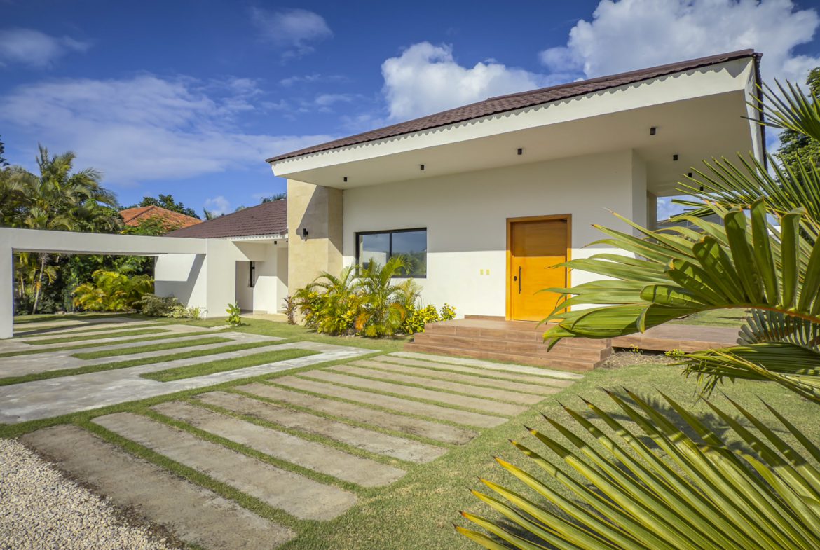 buyDRproperty Modern luxury villa with a unique driveway design in Sosua Ocean Village. Sosua Real Estate