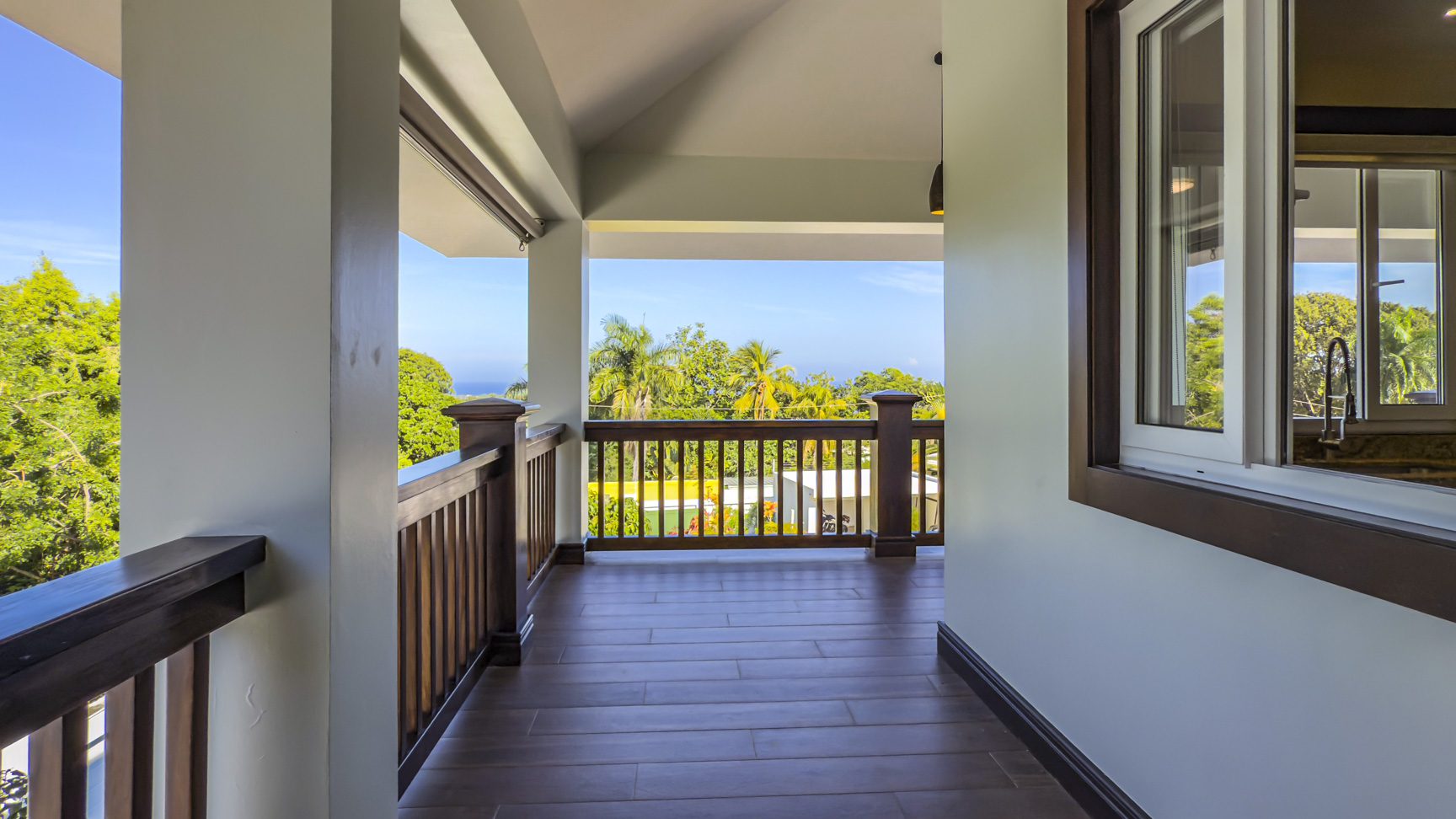 buyDRproperty Balcony view of the 3-bedroom villa for sale in La Mulata, showcasing the outdoor space and tropical scenery. Sosua Real Estate