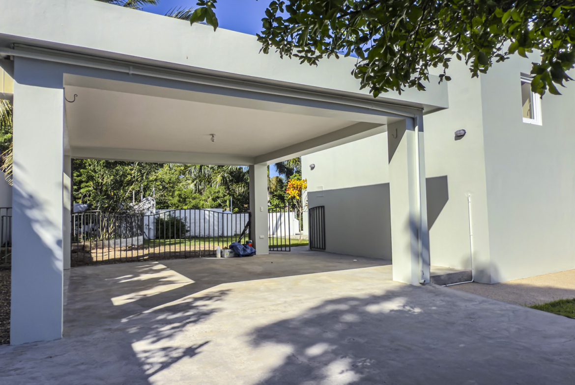 buyDRproperty Carport of a modern 3-bedroom villa for sale in La Mulata, Dominican Republic. Sosua Real Estate
