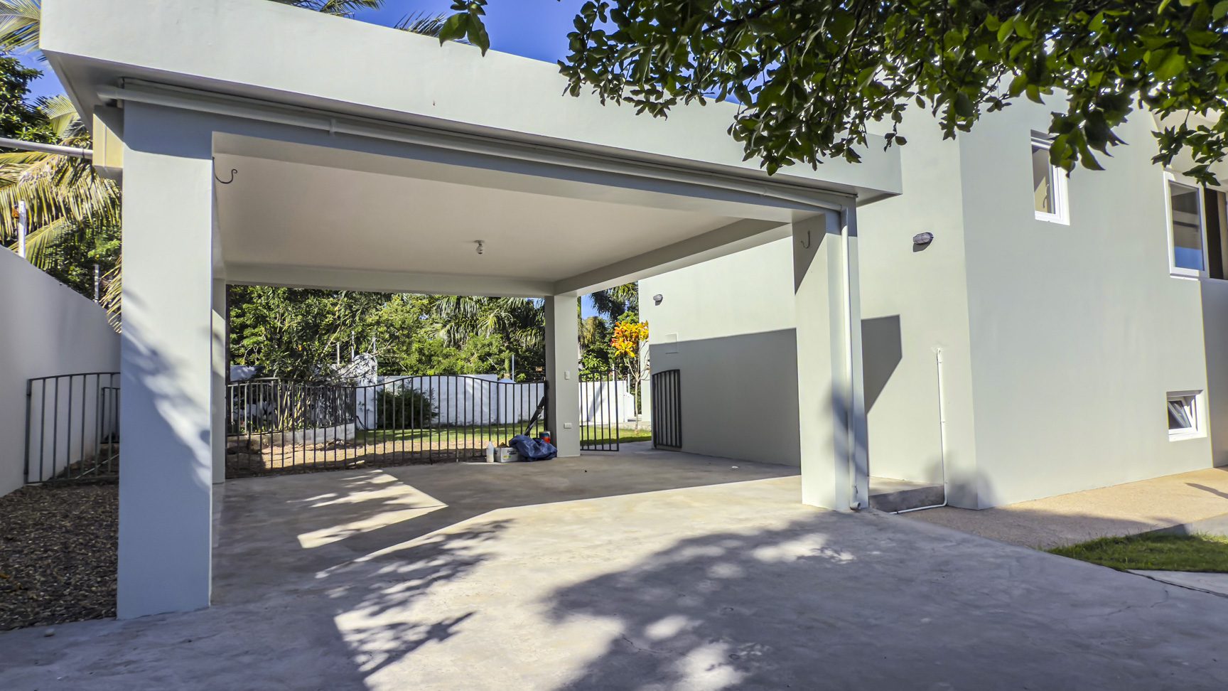 buyDRproperty Carport of a modern 3-bedroom villa for sale in La Mulata, Dominican Republic. Sosua Real Estate