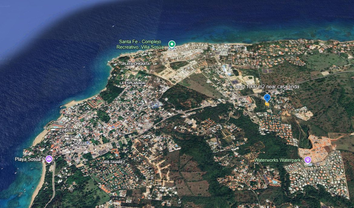buyDRproperty Aerial view of Sosúa, Dominican Republic, showing beaches, residential areas, and the Waterworks Waterpark. Sosua Real Estate