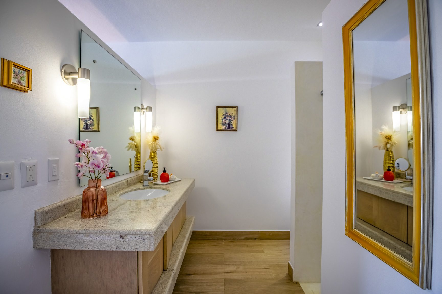 buyDRproperty Bathroom with granite countertop, modern lighting, and decorative accents. Sosua Real Estate
