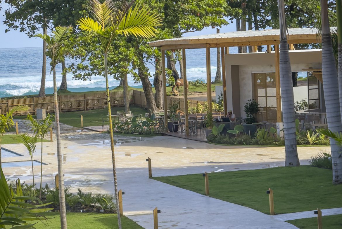 buyDRproperty Beachfront resort with pool, restaurant, and ocean views. Relaxing tropical vacation destination. Sosua Real Estate