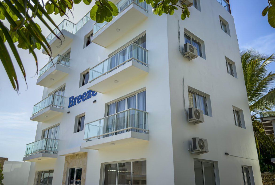 Exterior of Breeze Condos with balconies in Playa Laguna, Sosúa