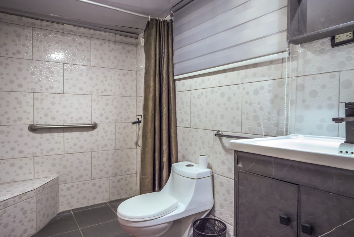 Bathroom in 1-bedroom condo for sale in central Sosúa