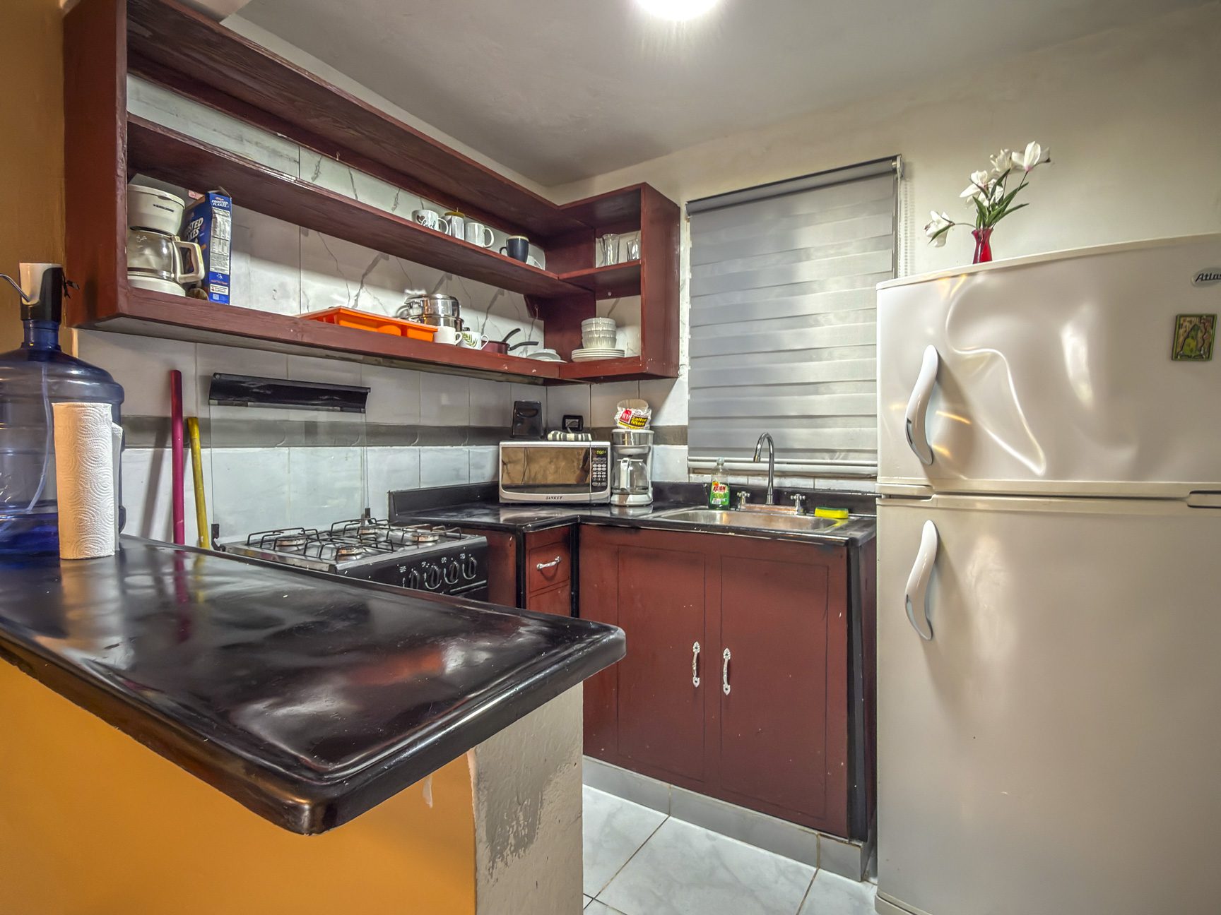 Kitchen in 1-bedroom condo for sale in central Sosúa