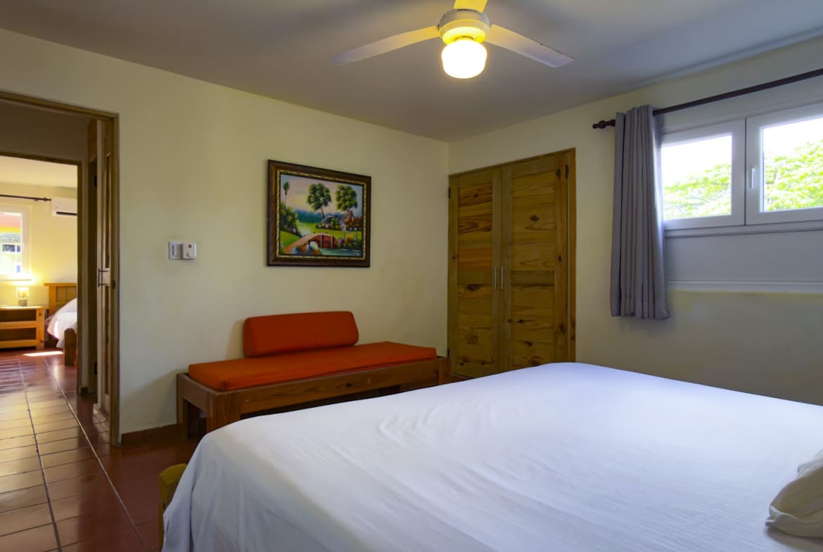 wardrobe, and a colorful painting. Sosua Real Estate