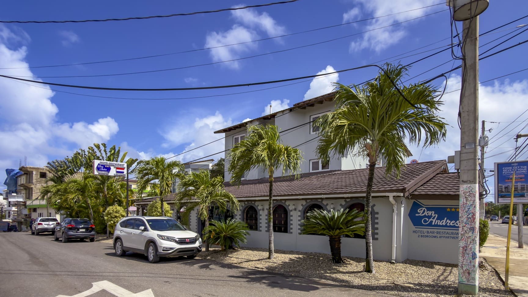 buyDRpropertytrees and cars in front