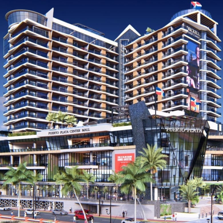 buyDRproperty Puerto Plata Center Mall building with palm trees and blue sky Sosua Real Estate