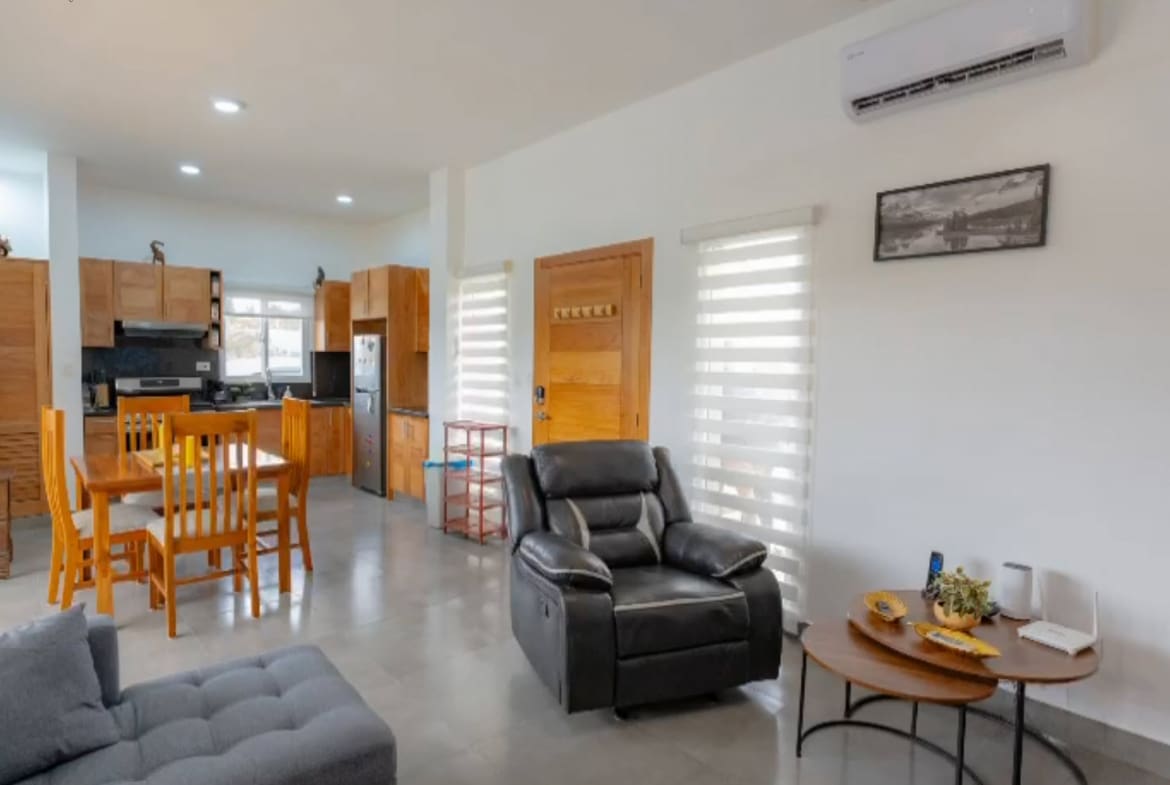 Open-plan living and dining area in 2-bedroom Villas Tisu Sosua villa
