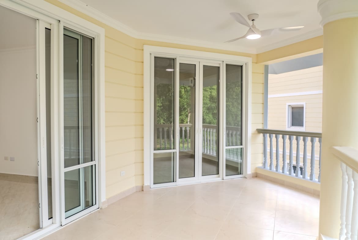 Covered balcony at Hispaniola Beach 2-bedroom condo in Sosua
