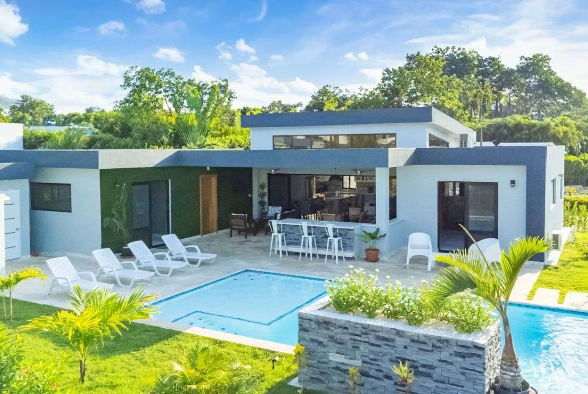 buyDRproperty Modern luxury villa with pool and outdoor bar in a tropical setting Sosua Real Estate