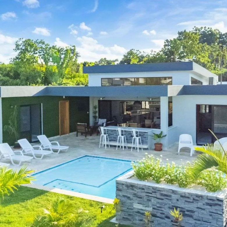 buyDRproperty Modern luxury villa with pool and outdoor bar in a tropical setting Sosua Real Estate